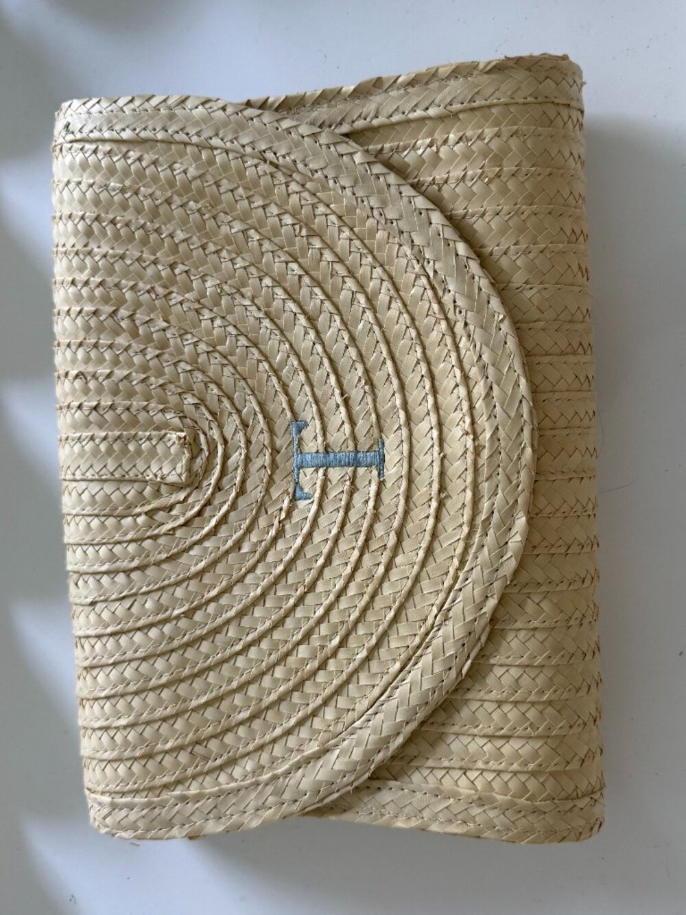 Straw Clutch With "T" Embroidered in Pale Blue Thread